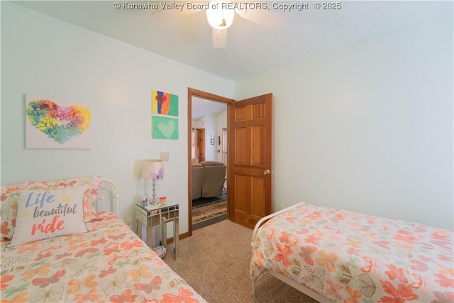 carpeted bedroom featuring a ceiling fan