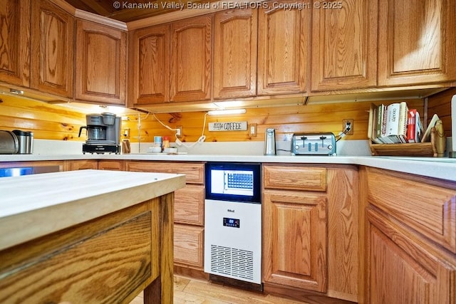 510 Shamrock Dr, Union, WV 26833 - kitchen featuring light countertops, brown cabinetry, and wooden walls