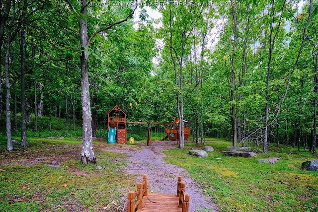 510 Shamrock Dr, Union, WV 26833 - view of yard featuring a wooded view and a playground