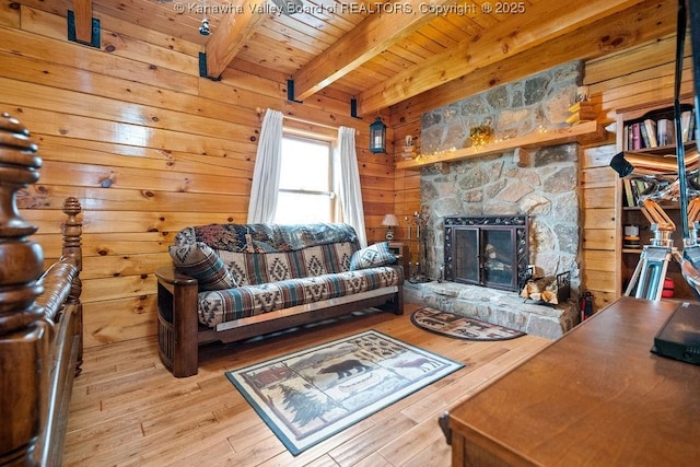 510 Shamrock Dr, Union, WV 26833 - living area with wood ceiling, a fireplace, wooden walls, wood finished floors, and beamed ceiling