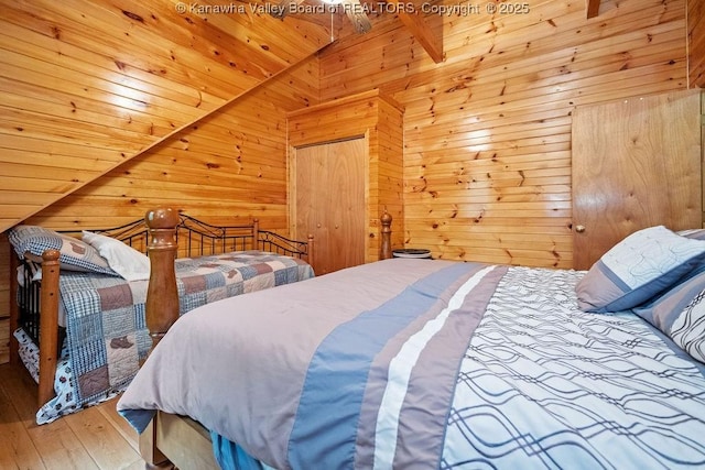 510 Shamrock Dr, Union, WV 26833 - bedroom with wood ceiling, vaulted ceiling with beams, wooden walls, and hardwood / wood-style flooring
