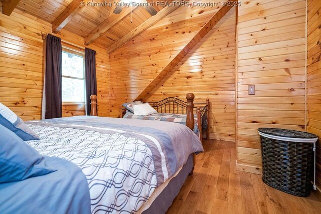 510 Shamrock Dr, Union, WV 26833 - bedroom with wood-type flooring, wood ceiling, vaulted ceiling with beams, and wooden walls