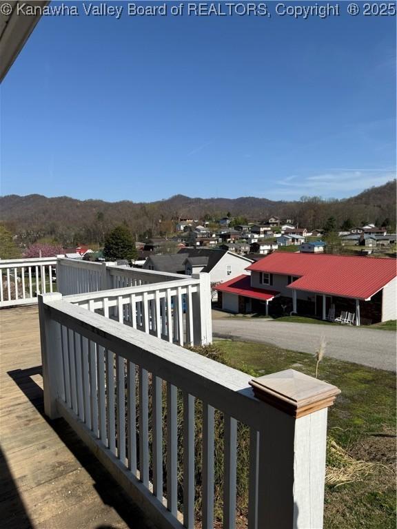 balcony featuring a mountain view