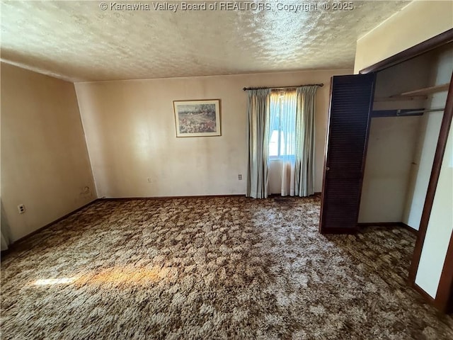 unfurnished bedroom featuring carpet, a closet, and a textured ceiling
