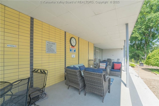 1800 Roundhill Rd Unit 404, Charleston, WV 25314 - view of patio / terrace featuring a carport