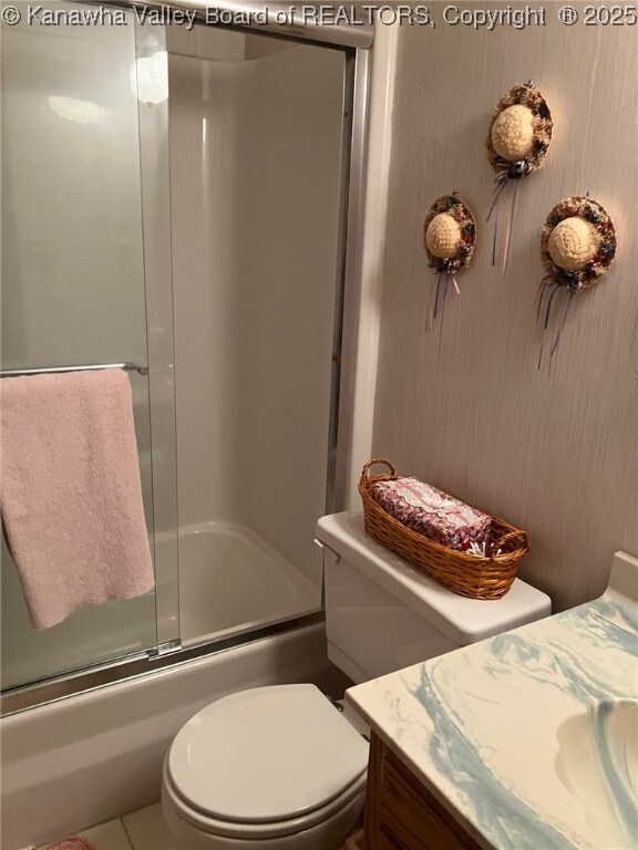 237 Lewis Ln, Point Pleasant, WV 25550 - full bathroom with toilet, vanity, combined bath / shower with glass door, and tile patterned floors