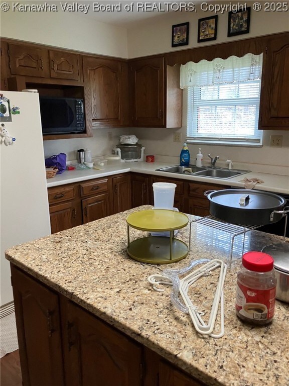 237 Lewis Ln, Point Pleasant, WV 25550 - kitchen featuring black microwave, a sink, and freestanding refrigerator