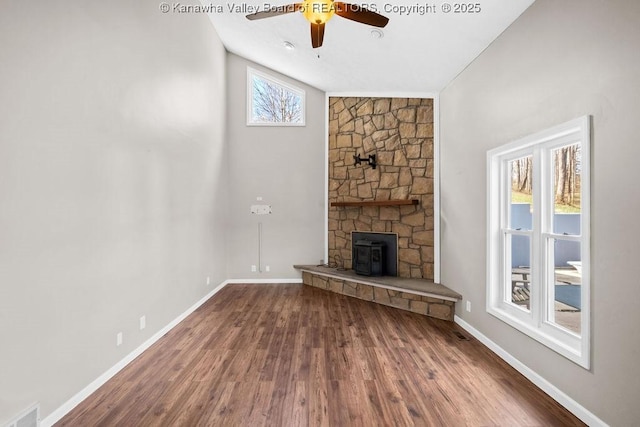25 Lilly Hls, South Charleston, WV 25309 - unfurnished living room with wood finished floors, visible vents, and ceiling fan