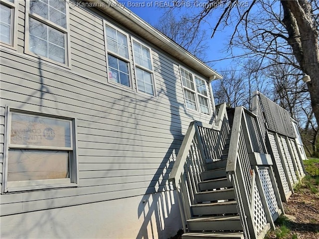 view of home's exterior with stairs