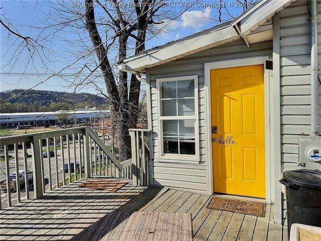 entrance to property with a balcony