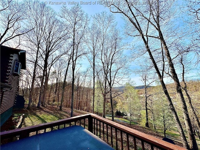 exterior space with a forest view
