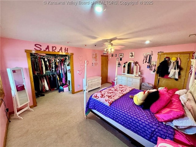 carpeted bedroom with a closet