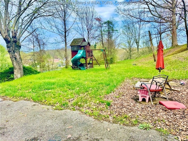 view of yard with a playground