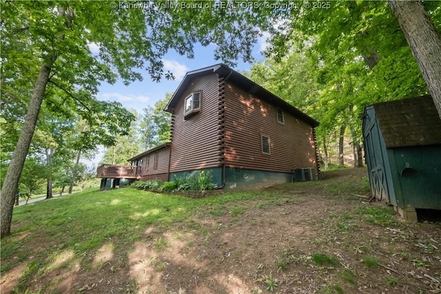 23 Mindia Ln, Alum Creek, WV 25003 - view of property exterior featuring log exterior, central AC, and a deck