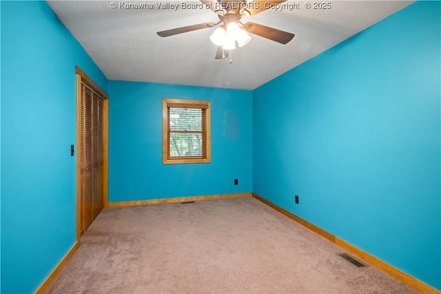 23 Mindia Ln, Alum Creek, WV 25003 - carpeted spare room with ceiling fan and baseboards