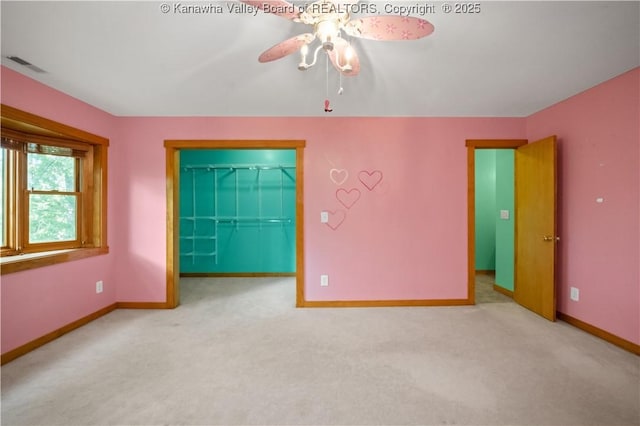 23 Mindia Ln, Alum Creek, WV 25003 - carpeted empty room with baseboards and ceiling fan