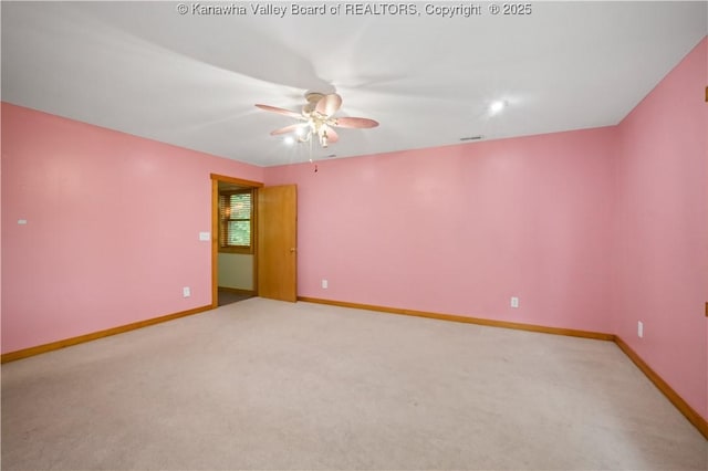 23 Mindia Ln, Alum Creek, WV 25003 - empty room featuring a ceiling fan, baseboards, and light carpet
