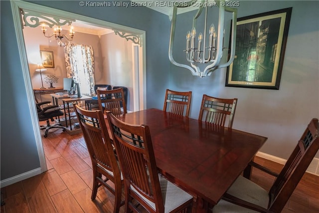 120 Rosewood Dr, Hurricane, WV 25526 - dining room with a chandelier, baseboards, ornamental molding, and wood finished floors