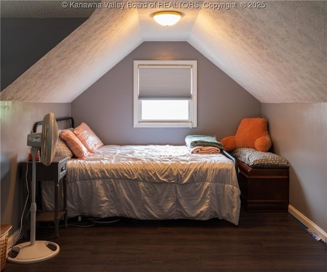 120 Rosewood Dr, Hurricane, WV 25526 - bedroom featuring a textured ceiling, wood finished floors, and lofted ceiling