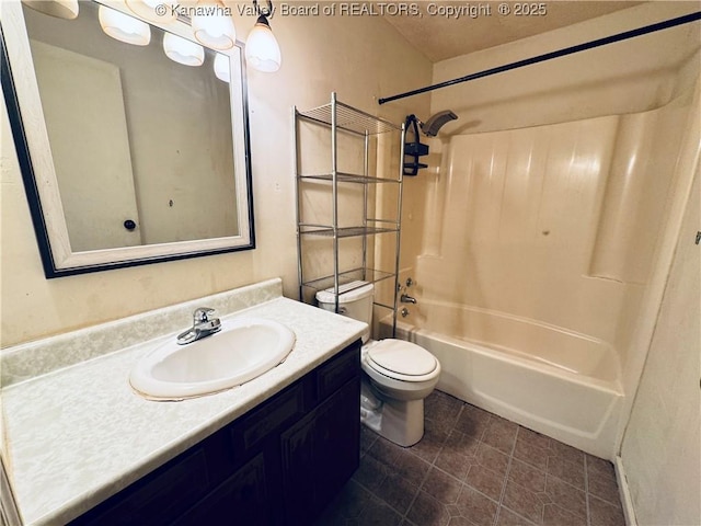 full bath with toilet, vanity, and  shower combination