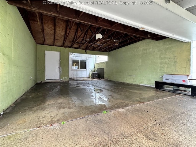 interior space featuring concrete block wall