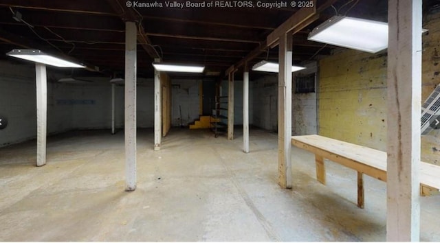 unfinished basement with stairway