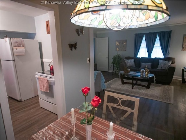 dining space featuring wood finished floors
