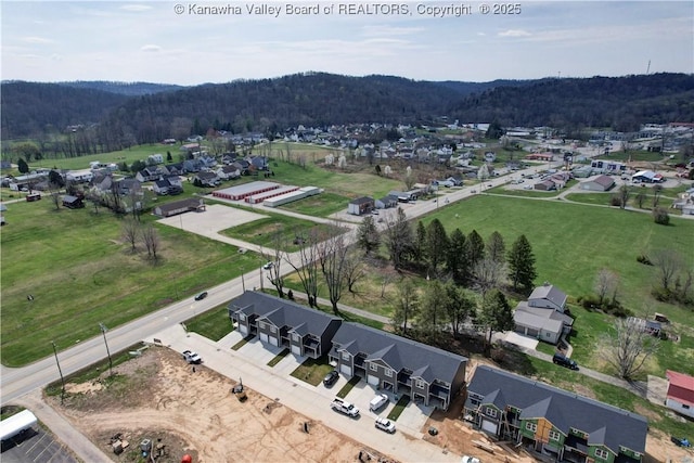 bird's eye view with a forest view