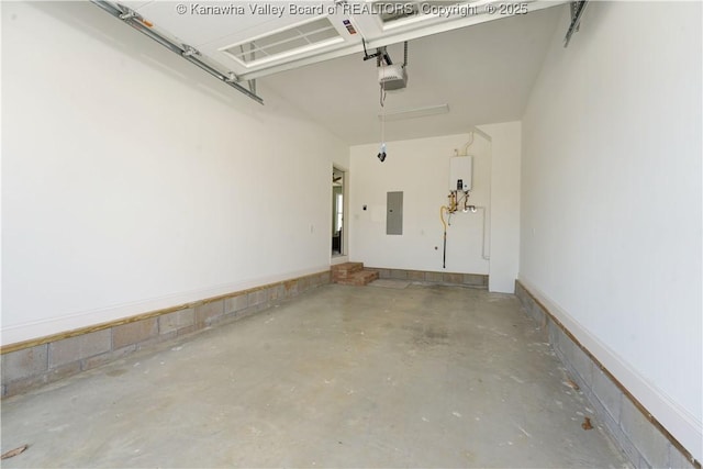 garage with a garage door opener, electric panel, and water heater