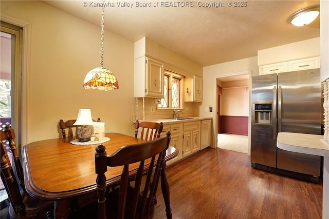 906 Hughes Dr, Saint Albans, WV 25177 - dining room featuring dark wood-style flooring and lofted ceiling