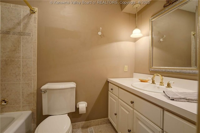 906 Hughes Dr, Saint Albans, WV 25177 - full bathroom featuring vanity, baseboards, tile patterned floors, shower / tub combination, and toilet