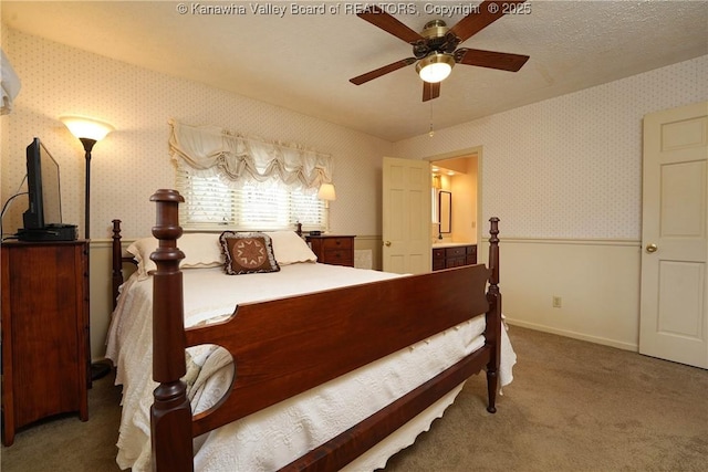 906 Hughes Dr, Saint Albans, WV 25177 - carpeted bedroom featuring baseboards, a textured ceiling, ceiling fan, and wallpapered walls