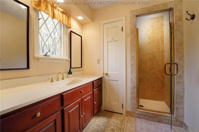 906 Hughes Dr, Saint Albans, WV 25177 - full bathroom with a shower stall, tile patterned floors, and vanity