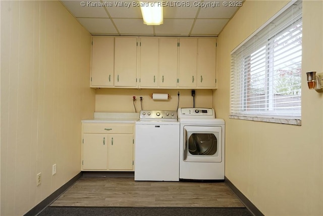 906 Hughes Dr, Saint Albans, WV 25177 - washroom with cabinet space, washing machine and clothes dryer, baseboards, and dark wood-style flooring