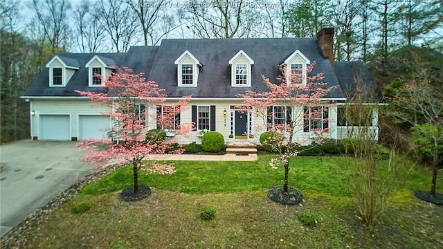 1578 Hampton Rd, Charleston, WV 25314 - new england style home with concrete driveway, a chimney, a front lawn, and an attached garage