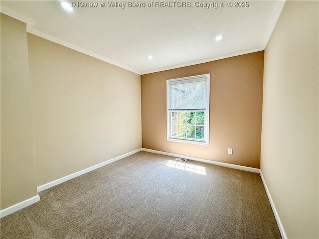 carpeted spare room featuring recessed lighting, visible vents, baseboards, and crown molding