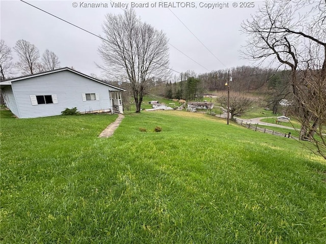view of yard with fence