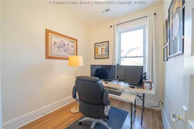 12 Arlington Ct, Charleston, WV 25301 - office area featuring visible vents, baseboards, and wood finished floors