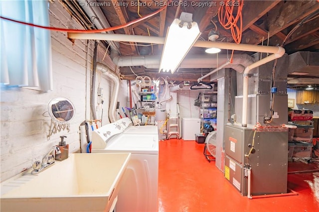 12 Arlington Ct, Charleston, WV 25301 - unfinished basement with washer and dryer, a sink, gas water heater, and heating unit