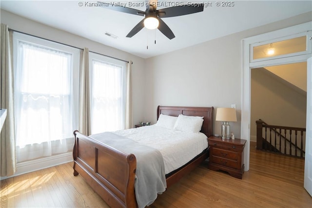 12 Arlington Ct, Charleston, WV 25301 - bedroom featuring visible vents, baseboards, a ceiling fan, and wood finished floors