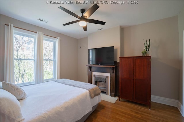 12 Arlington Ct, Charleston, WV 25301 - bedroom featuring visible vents, baseboards, a ceiling fan, and wood finished floors