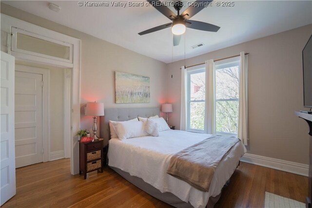 12 Arlington Ct, Charleston, WV 25301 - bedroom with wood finished floors, ceiling fan, baseboards, and visible vents