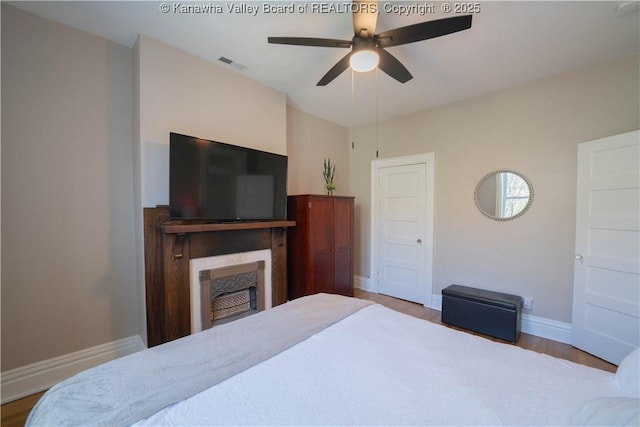 12 Arlington Ct, Charleston, WV 25301 - bedroom featuring visible vents, baseboards, and wood finished floors