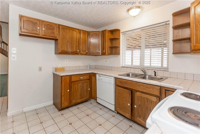 kitchen with open shelves, white dishwasher, range with electric stovetop, a sink, and brown cabinetry