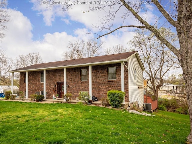 139 Betty Ln, Scott Depot, WV 25560 - raised ranch with brick siding, cooling unit, and a front lawn