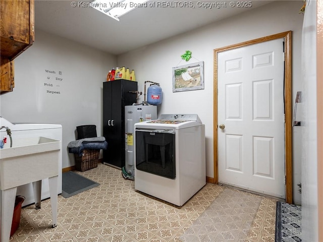139 Betty Ln, Scott Depot, WV 25560 - laundry room featuring water heater, a sink, and cabinet space