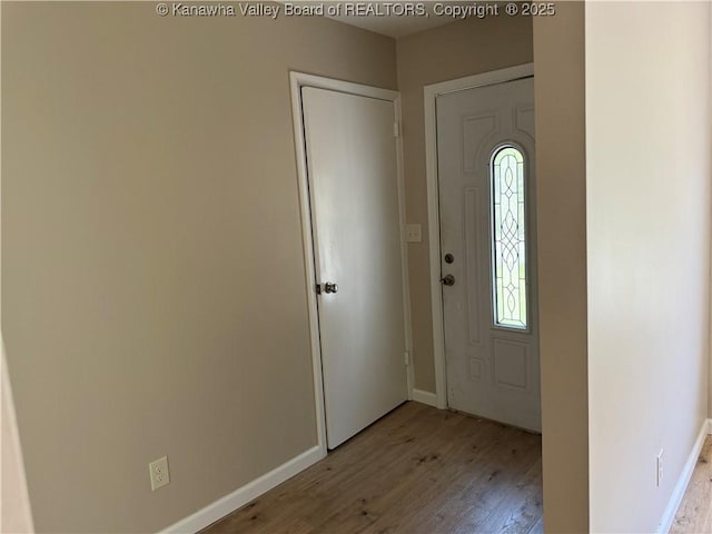 1651 Glenwood Rd, Milton, WV 25541 - entryway featuring baseboards and wood finished floors