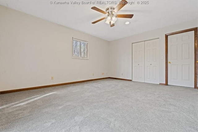 141 Wedgewood Rd, Ravenswood, WV 26164 - unfurnished bedroom featuring a closet, carpet flooring, baseboards, and ceiling fan
