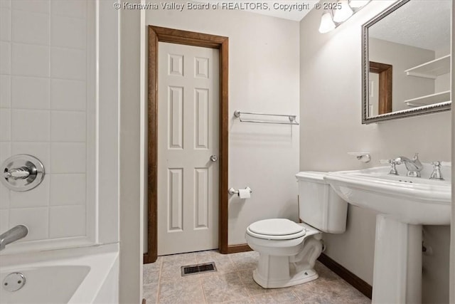 141 Wedgewood Rd, Ravenswood, WV 26164 - full bath with bathing tub / shower combination, visible vents, toilet, tile patterned floors, and baseboards
