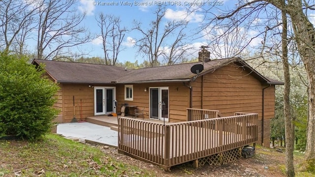 141 Wedgewood Rd, Ravenswood, WV 26164 - rear view of property with french doors, a deck, and a chimney